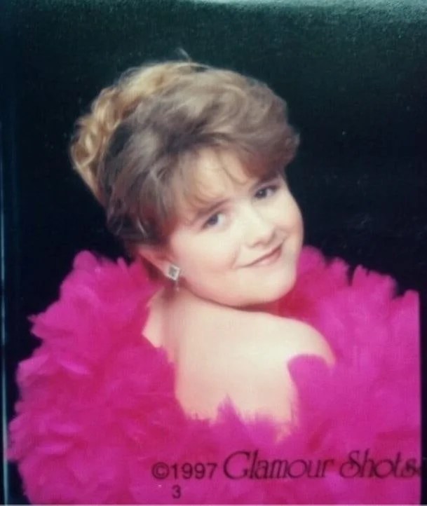   This photo alone was the cause of Glamour Shots’ shuttering its doors.  